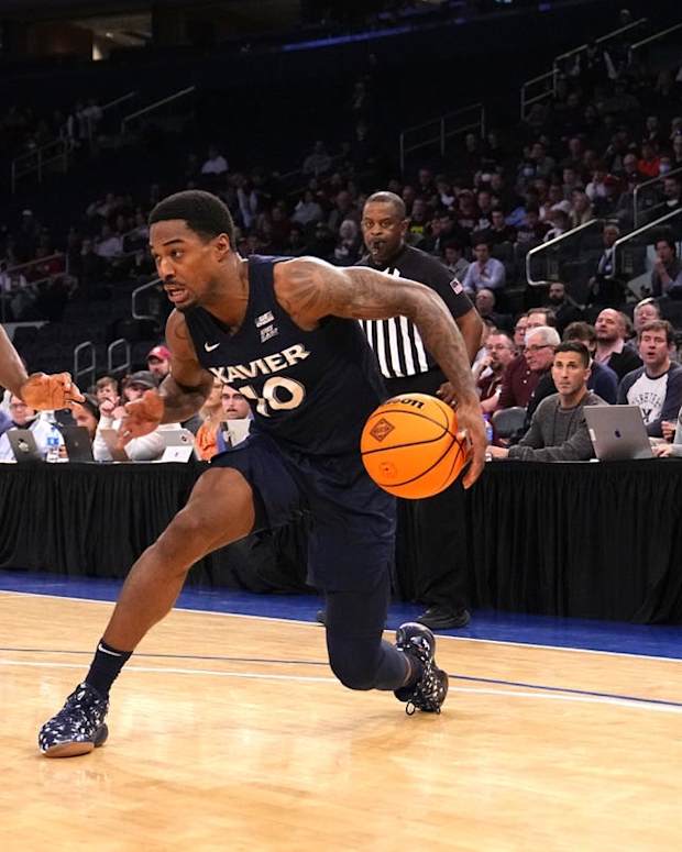 Mar 31, 2022; New York, New York, USA; Xavier Musketeers guard Nate Johnson (10) dribbles the ball against Texas A&amp;M Aggies forward Henry Coleman III (15) during the second half of the NIT college basketball finals at Madison Square Garden. Mandatory Credit: Gregory Fisher-USA TODAY Sports